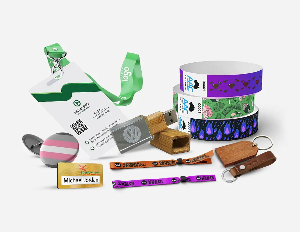 A collection of trade show and event essentials, including ID badges, wristbands, USB drives, keychains, and name tags